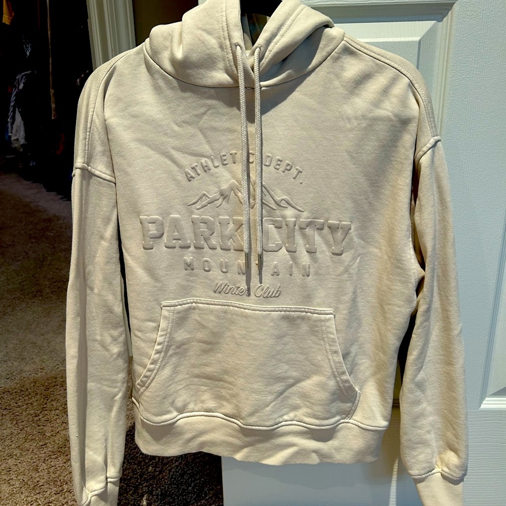 Soft beige hoodie from the Garage.  Great condition/ never worn.  Size XS